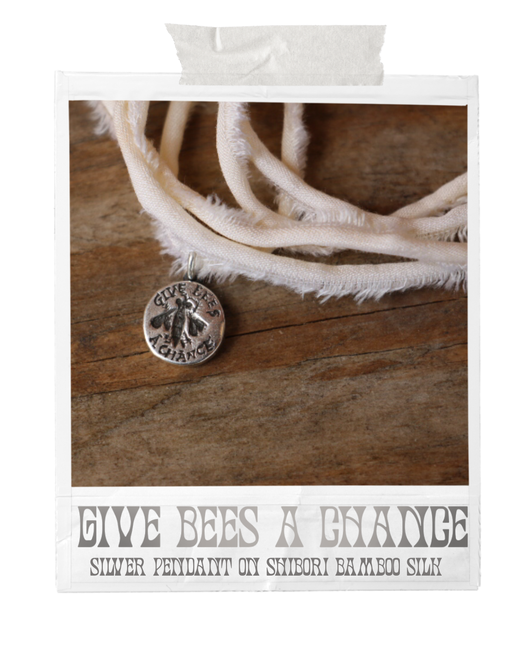 handmade sterling silver bee pendant on a bamboo silk ribbon